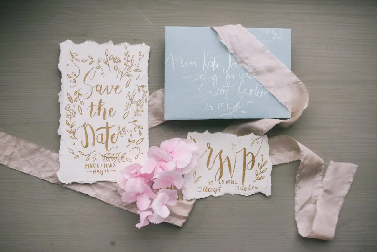 wedding invitation set laid out on table