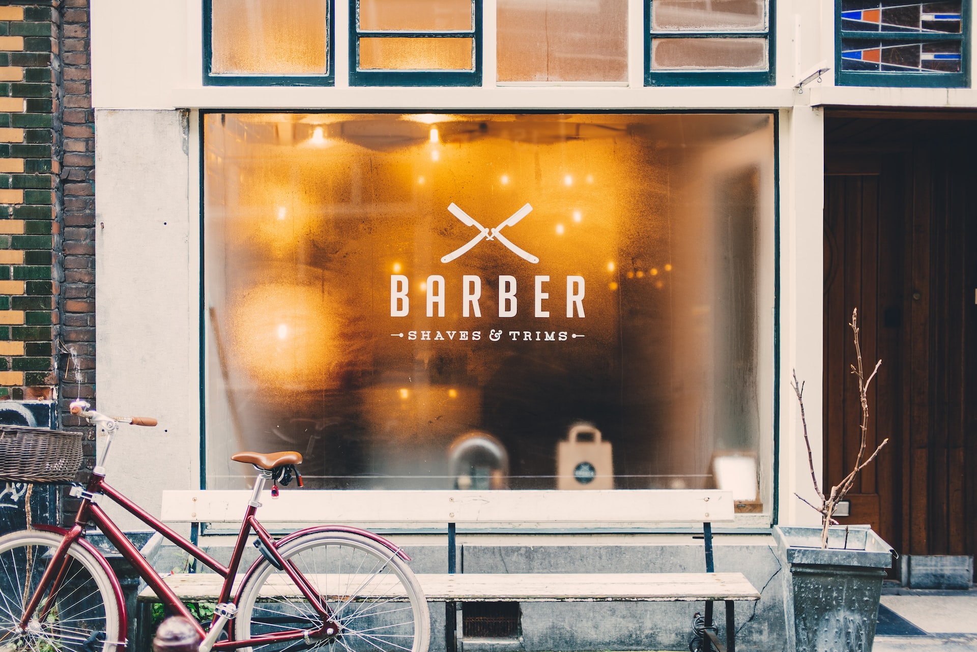 perforated window vinyl - barber shop window