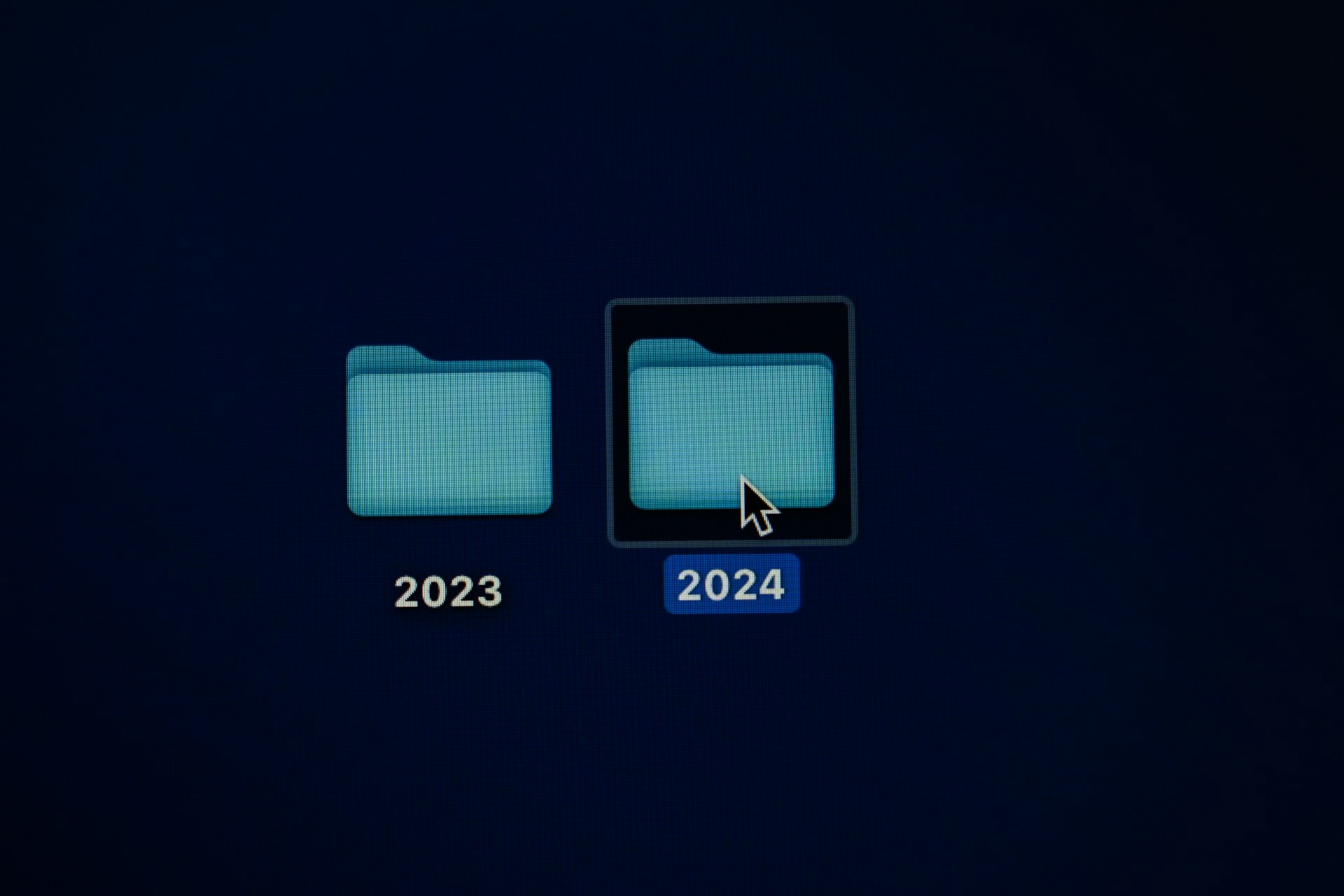 desktop files labeled 2023 and 2024
